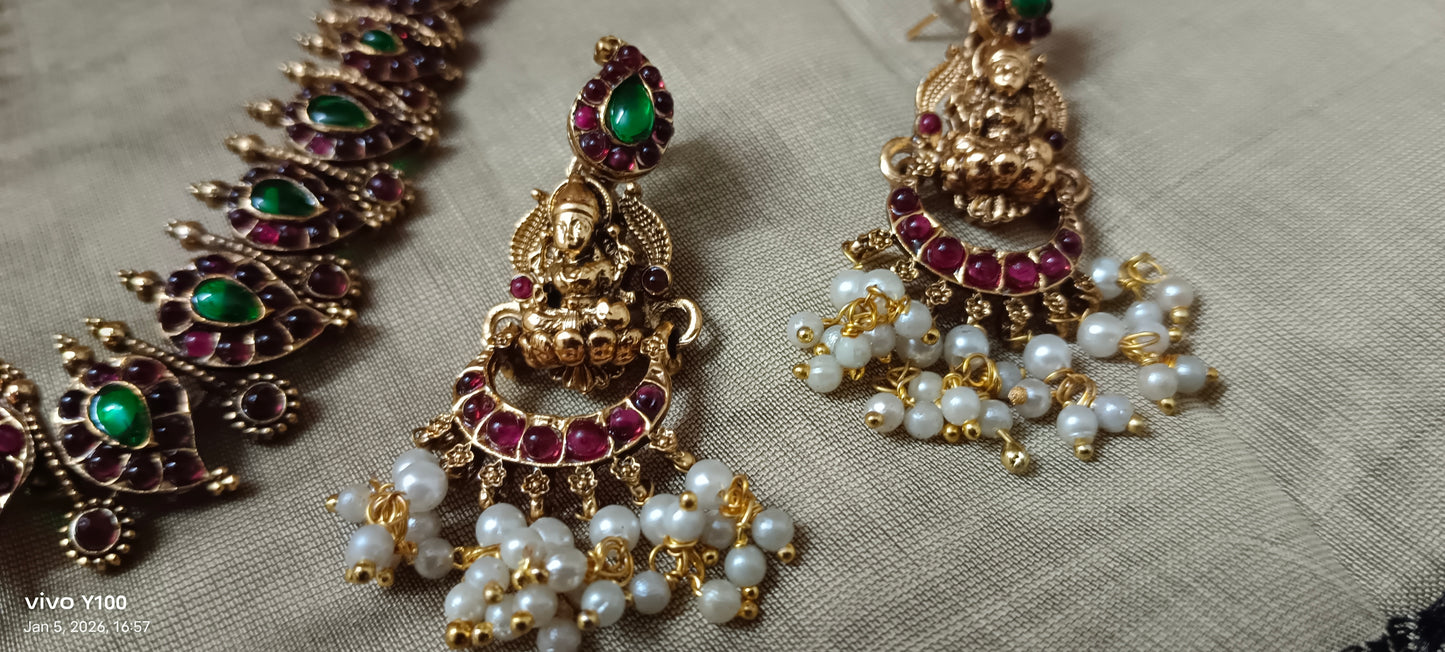 Beautiful antique Lakshmi set with red green stones and pearl