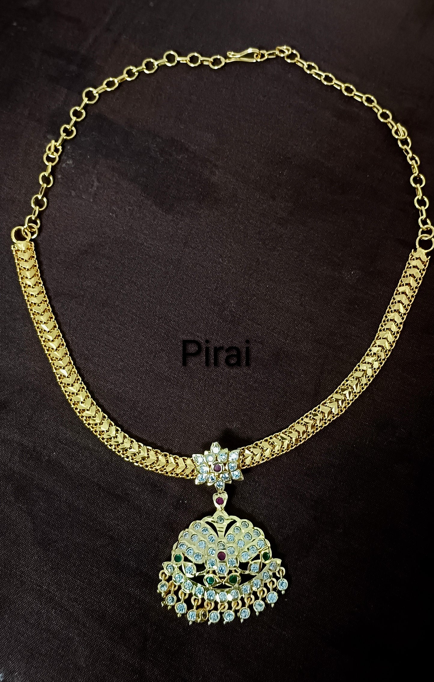 Traditional Addigai with white red and green stone