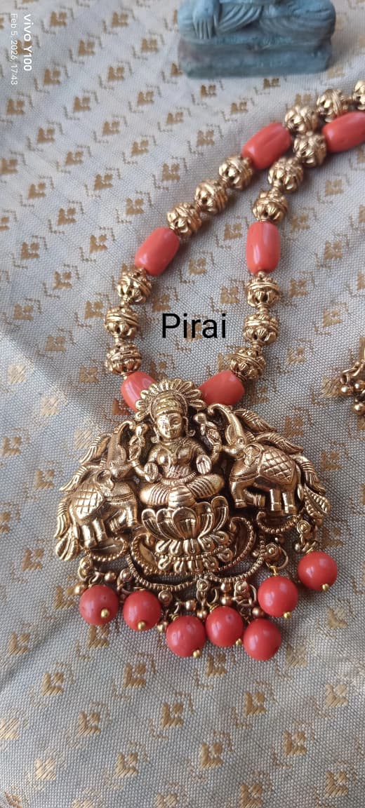 Elegant Coral Jewellry set with Lakshmi pendant